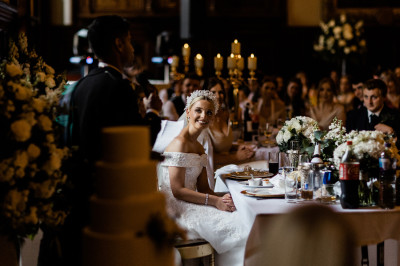 A bride at a wedding at Trades Hall